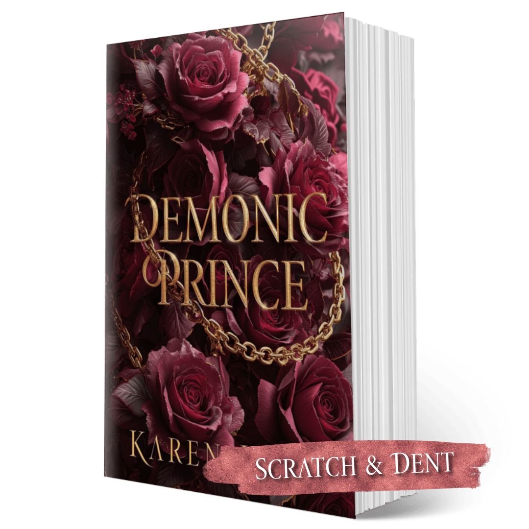Book cover of 'Demonic Prince' with roses and a chain on a white background; scratch and dent label.