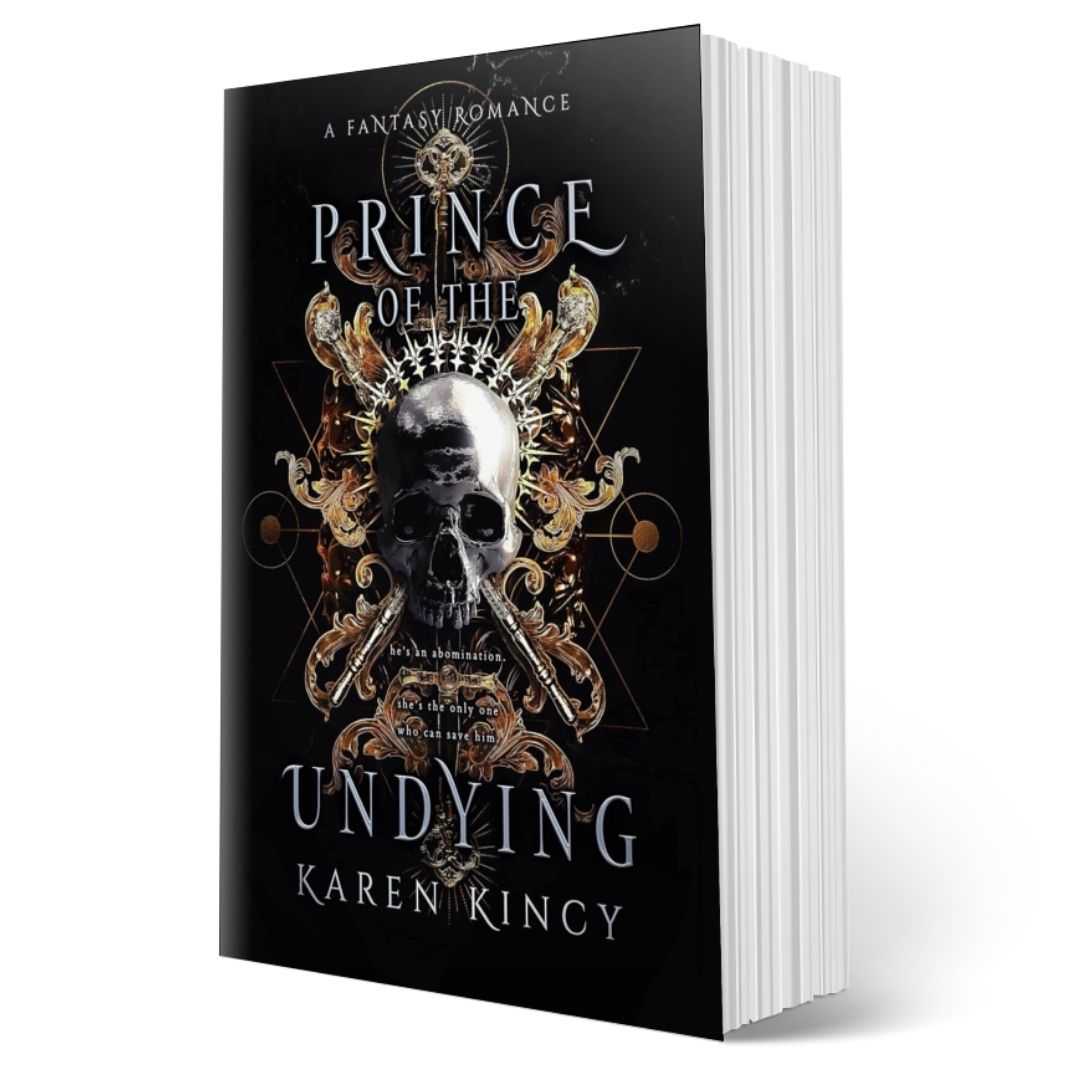 Book titled 'Prince of the Undying' by Karen Kincy with a dark cover featuring a skull and ornate designs.