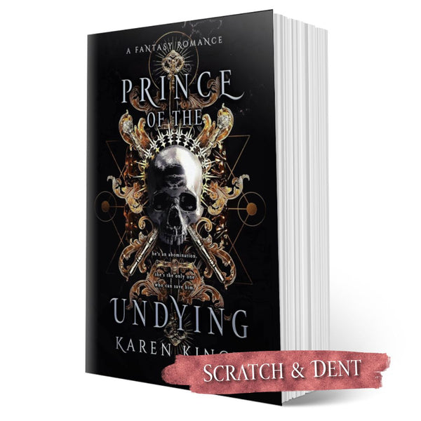 Book titled 'Prince of the Undying' by Karen King with a skull design on the cover; scratch and dent label.