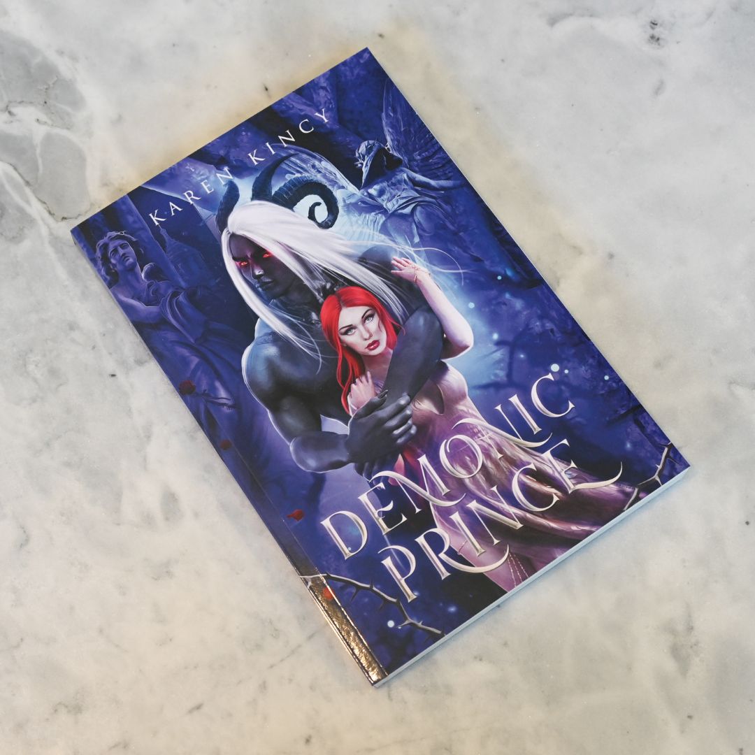 Book titled 'Demonic Prince' by Karen Kincy on a textured surface