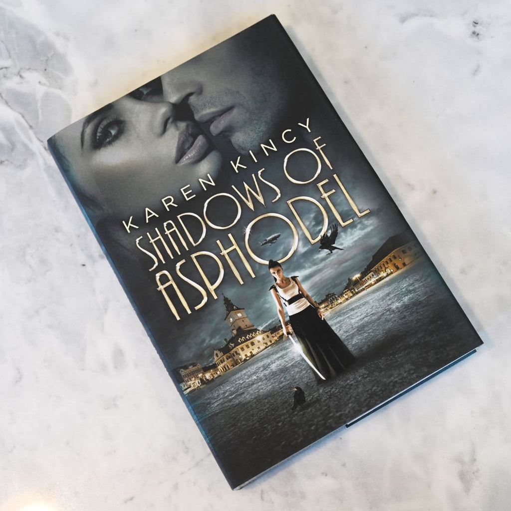 Book titled 'Shadows of Asphodel' by Karen Kincy on a textured surface