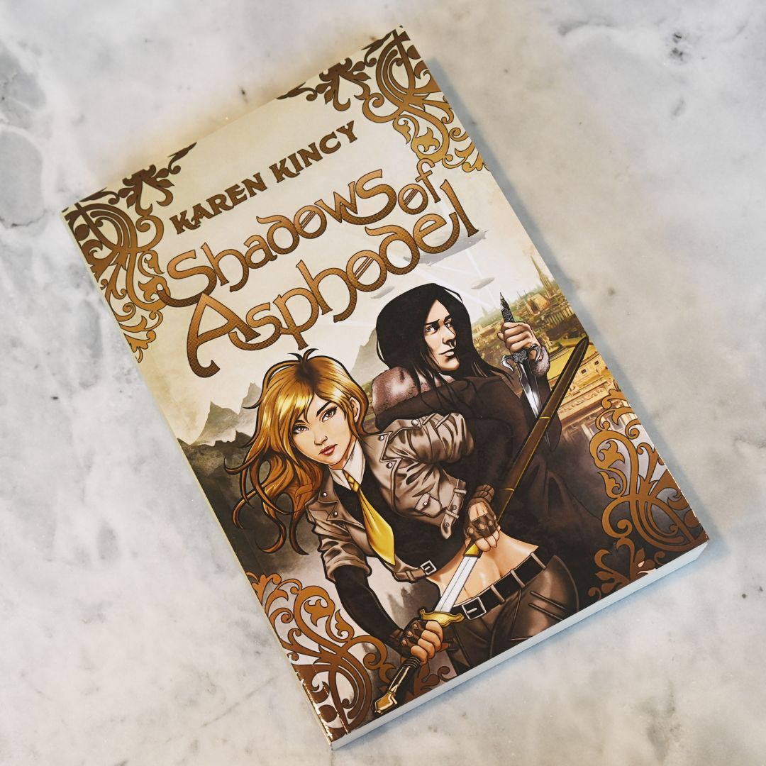 Book titled 'Shadows of Asphodel' by Karen Kincy on a textured surface